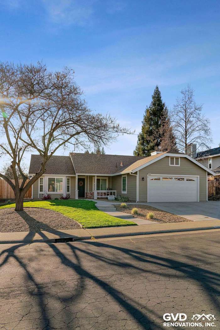 Monterey Taupe HardiePlank siding with Arctic White trim on a renovated Folsom home exterior