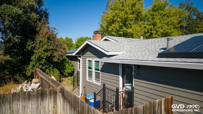 New Alside Prodigy vinyl siding in gray color with white trim on a home in Carmichael, CA