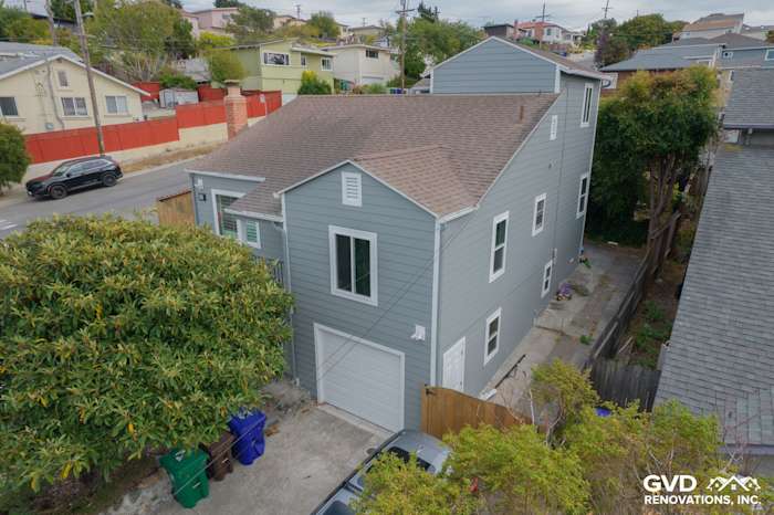 Gray Slate James Hardie siding with Arctic White trim on a two-story Richmond, CA home exterior