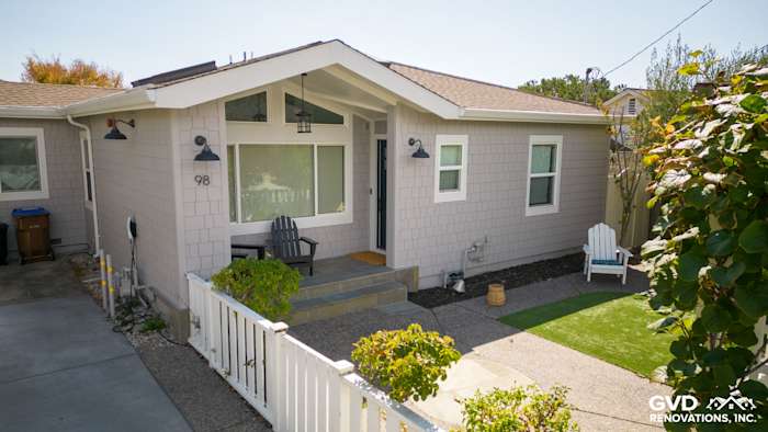 New Pearl Gray James Hardie shingle siding with Arctic White trim on a Mill Valley home exterior