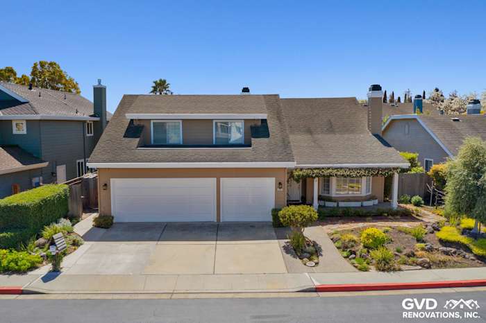 Home exterior in Foster City featuring Khaki Brown James Hardie siding and Arctic White trim, manicured landscaping