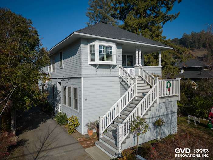 Modern home exterior featuring Prime James Hardie Lap Siding in soft blue and Arctic White HardieTrim, San Anselmo