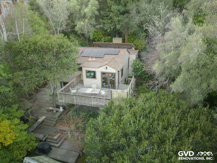 Aerial view of Oakland home featuring Khaki Brown James Hardie siding, Timber Bark trim, and surrounded by greenery