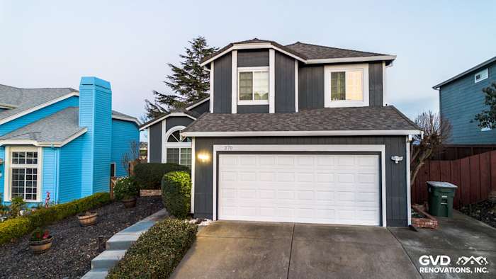 Modern home exterior featuring James Hardie Evening Blue siding and Arctic White trim in Vallejo, CA