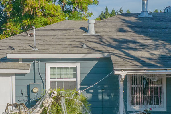 Home exterior featuring Evening Blue James Hardie siding with Arctic White trim in Concord, CA. Fresh, inviting look