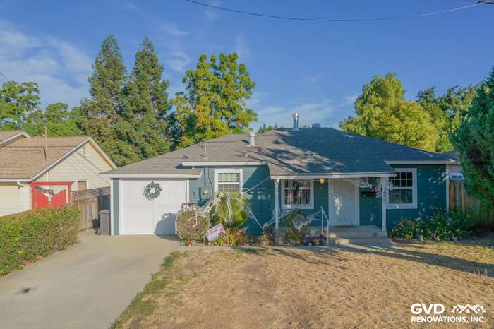 Home exterior featuring Evening Blue James Hardie siding with Arctic White trim in Concord, CA. Fresh, inviting look