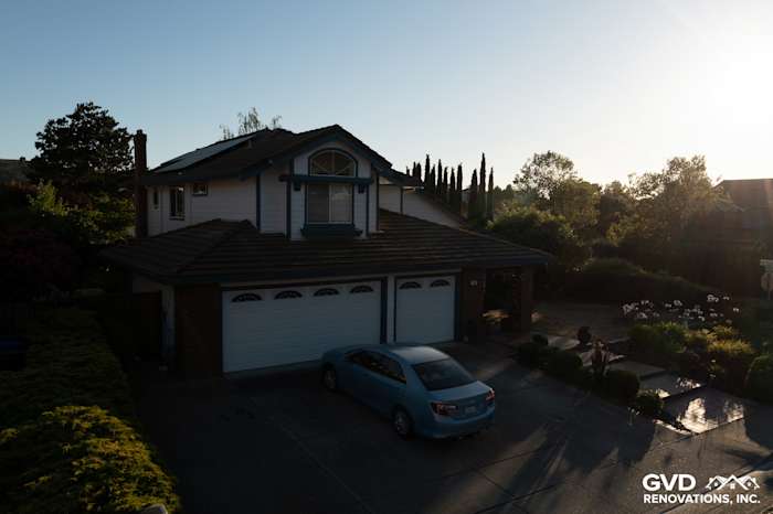 Charming home exterior featuring Arctic White James Hardie siding and Simonton windows in Hercules, CA