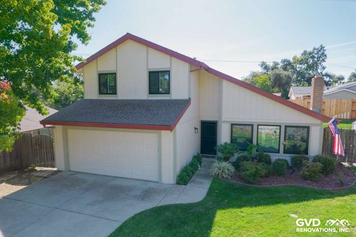 Newly installed T1-11 siding and Anlin windows on contemporary Orangevale home exterior with landscaping