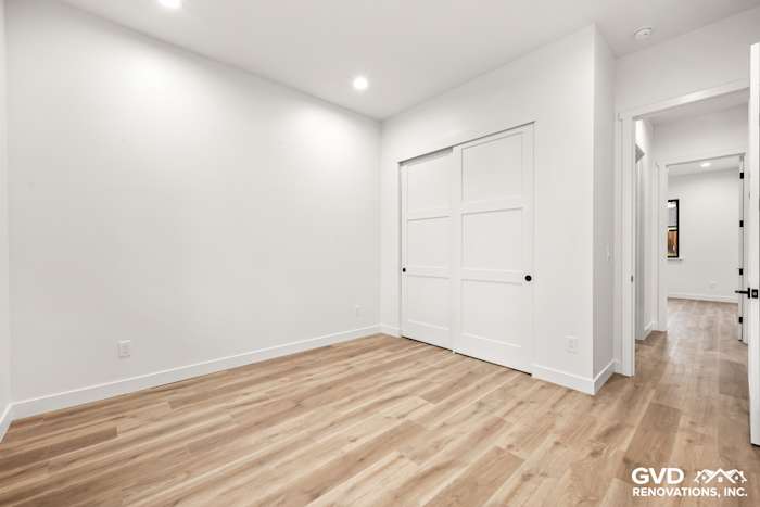 Bright interior of a new home in Paradise, CA, featuring white walls and light wood flooring