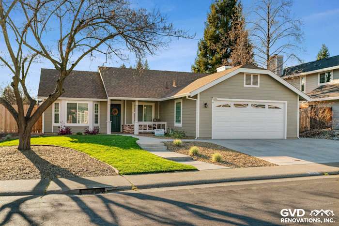 Monterey Taupe HardiePlank siding and Arctic White trim on a renovated Folsom home exterior