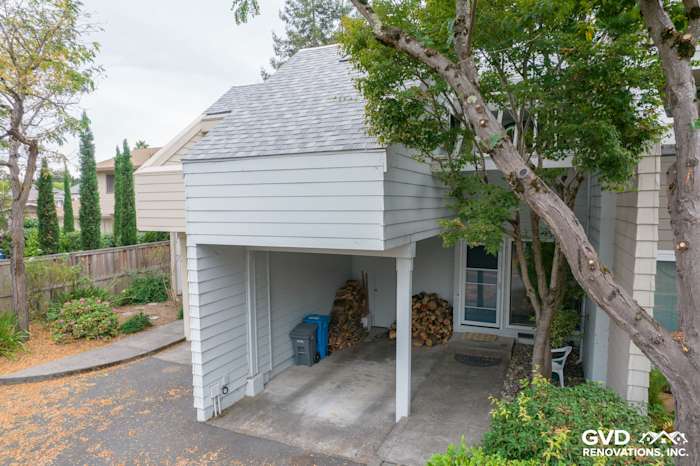 Updated quadplex with James Hardie siding, gray shingles, and covered entry in Santa Rosa