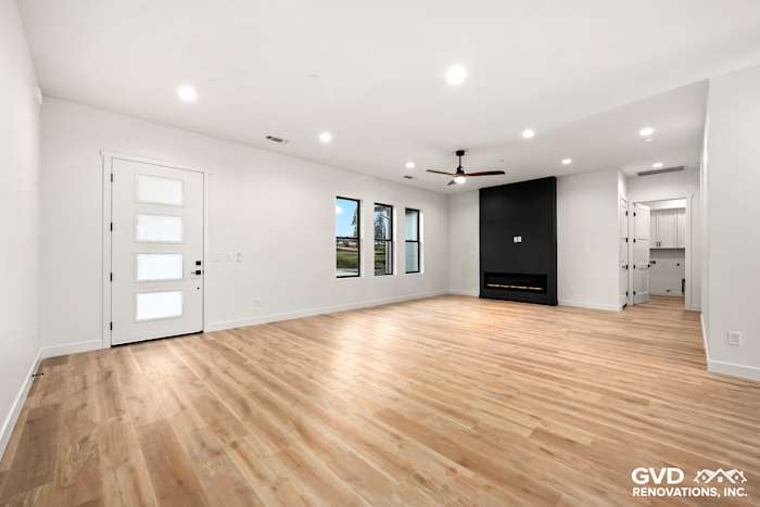 Spacious living area with high ceilings, large windows, and modern finishes in new construction home, Paradise, CA