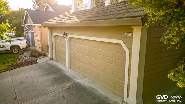 Khaki Brown James Hardie siding and Alside vinyl windows on a Santa Rosa home exterior with upgraded garage doors