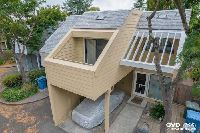 Two-story quadplex featuring newly installed light tan James Hardie siding and modern skylights in Santa Rosa