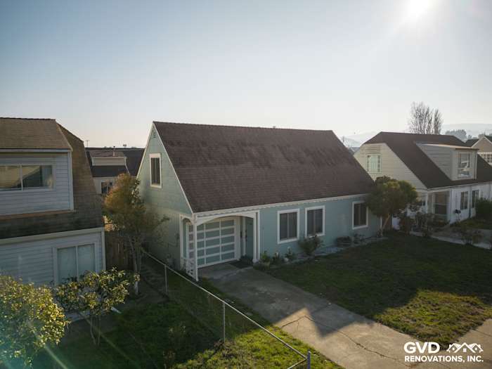 Aerial view of a home featuring newly installed James Hardie Artisan Lap Siding in soft blue