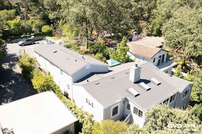 Aerial view of a home featuring Pearl Gray James Hardie shingle siding and a gray roof in Orinda, CA