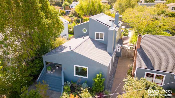 Corte Madera home with James Hardie Evening Blue siding and Arctic White trim, showcasing modern exterior design