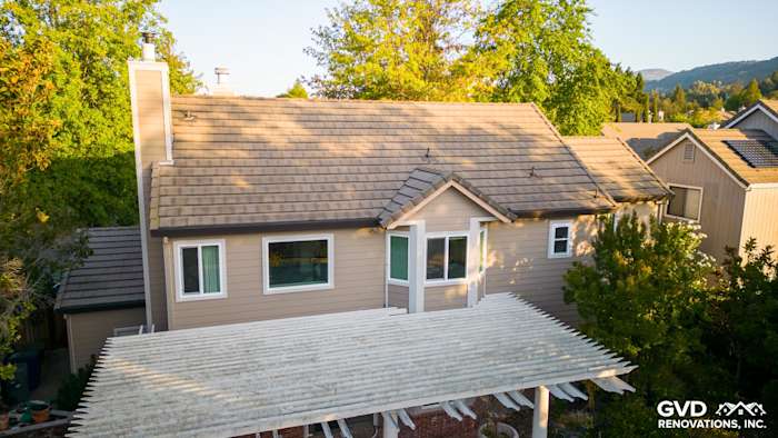 Home exterior showcasing James Hardie Cedarmill Siding and Alside Vinyl Windows in Sonoma