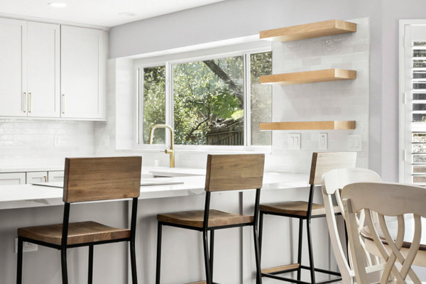 Modern kitchen remodel in El Dorado Hills featuring quartz countertops, custom cabinets, and spacious seating area