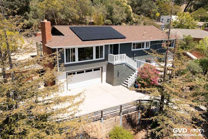 Home exterior featuring James Hardie Iron Gray siding, Arctic White trim, and solar panels in San Rafael, CA