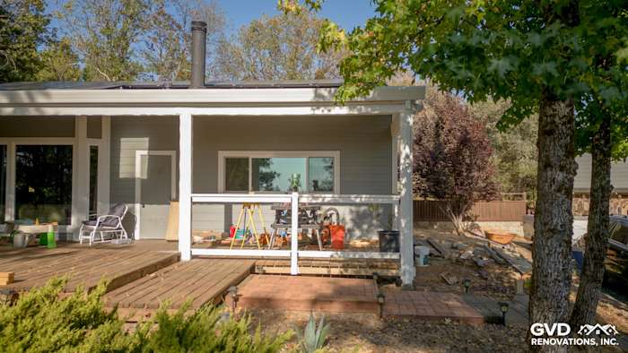 Home exterior featuring Gray Slate James Hardie siding, Arctic White trim, and wooden deck in Meadow Vista, CA