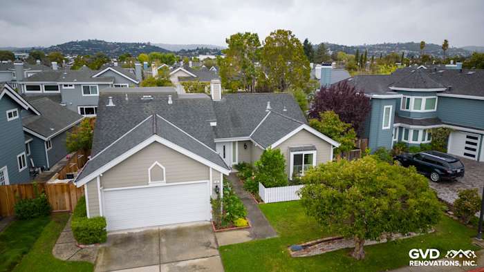 Foster City home featuring James Hardie siding in Monterey Taupe and new Milgard windows