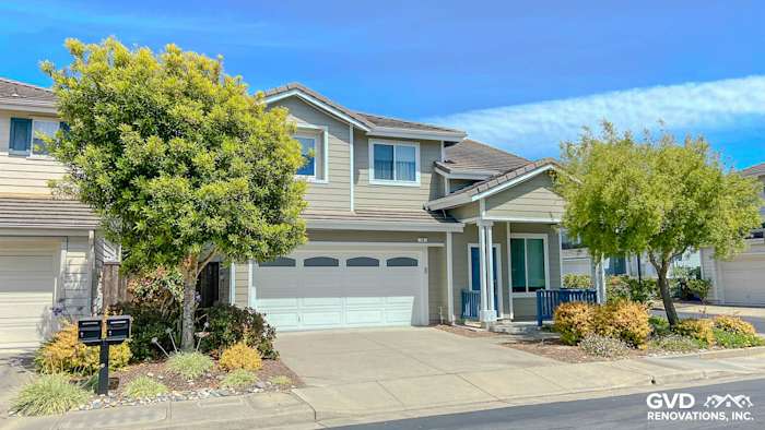 Front exterior of a home featuring James Hardie siding in Monterey Taupe and Anlin windows with Arctic White trim