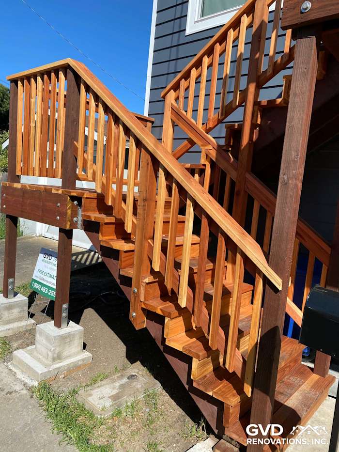 New wooden deck and steps with railings featuring natural wood finish in Rio Vista, CA