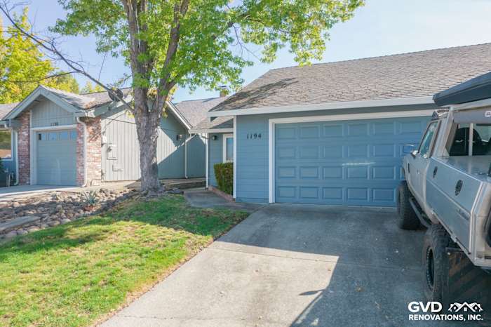 Home exterior featuring Boothbay Blue James Hardie siding and Arctic White trim in Roseville, CA
