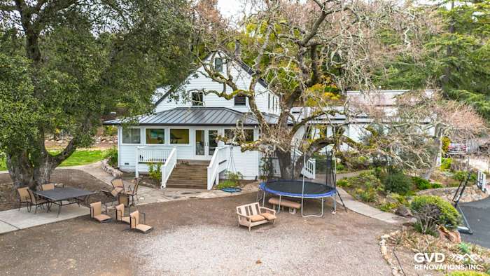 New James Hardie Arctic White siding and Marvin windows enhance this Sonoma home's exterior with modern charm