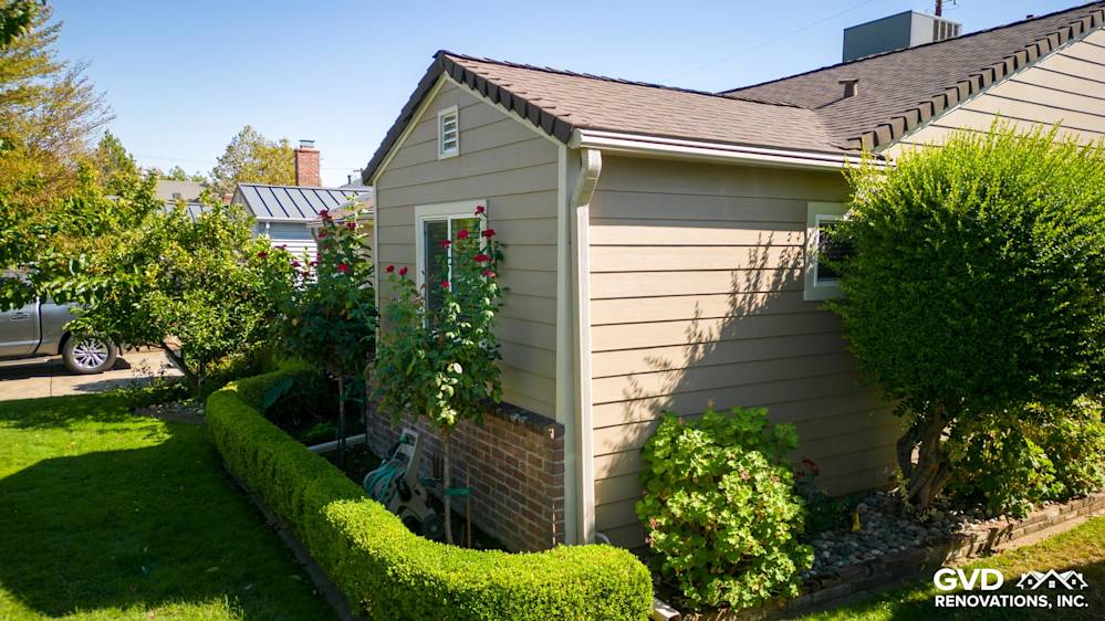 New Khaki Brown James Hardie siding on Sacramento home showing modern exterior and surrounding landscaping