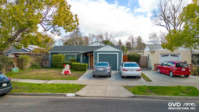Modern home exterior in Redwood City featuring James Hardie siding in Evening Blue with Arctic White trim