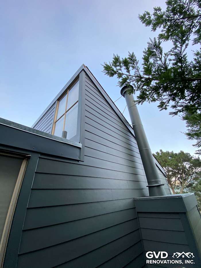 Sleek gray James Hardie siding on a modern home in Mill Valley, showcasing clean lines and vertical accents