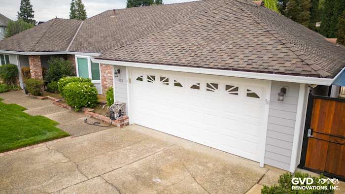 Updated home exterior featuring James Hardie Cedarmill siding and new Milgard windows in Roseville
