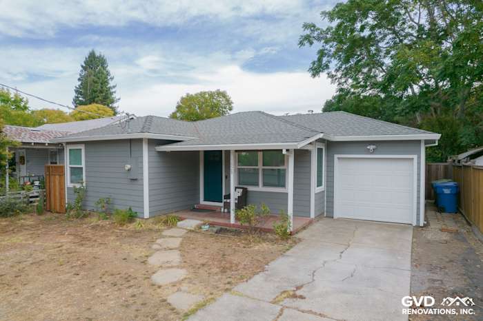 Home exterior in Novato with Gray Slate James Hardie siding, Arctic White trim, and new Milgard Tuscany windows