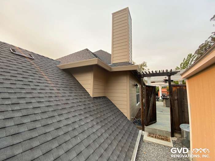 Khaki Brown James Hardie siding on home exterior with sloped roof and chimney in Petaluma