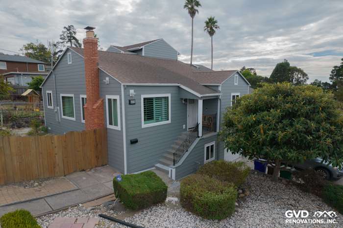 Modern Richmond home featuring Gray Slate James Hardie siding with Arctic White trim and landscaped front yard