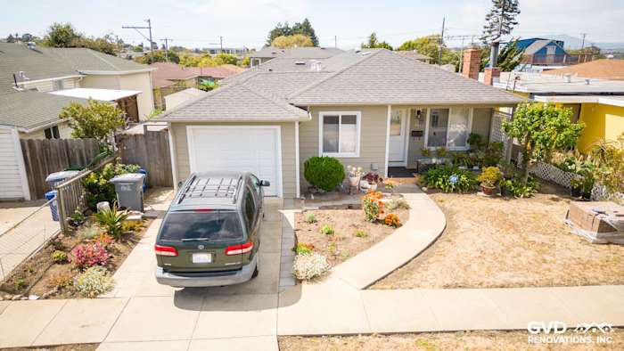 Front view of a renovated home in El Cerrito with James Hardie siding in Monterey Taupe and Arctic White trim