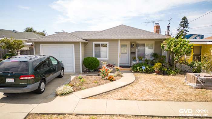 Home exterior featuring James Hardie Monterey Taupe siding and Arctic White trim, landscaped front yard in El Cerrito