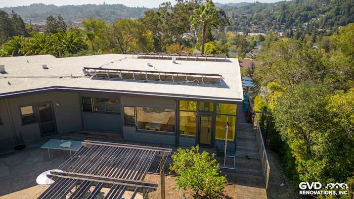 Contemporary home exterior featuring James HardiePlank Lap Siding in Night Gray, overlooking a lush landscape in San Rafael