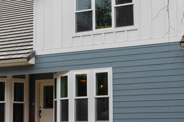 New Boothbay Blue James Hardie siding with Milgard windows on a modern Sutter Creek home exterior
