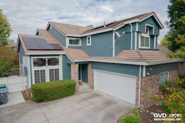 Home exterior featuring James Hardie Evening Blue lap siding and brick accents in Petaluma, CA