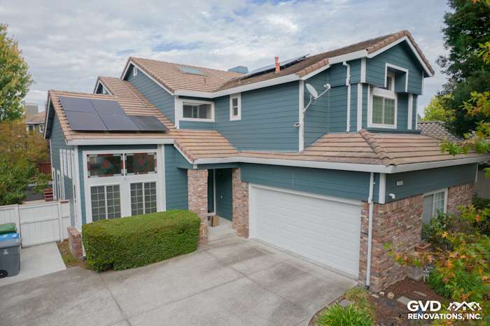 Home exterior featuring James Hardie Evening Blue lap siding and brick accents in Petaluma, CA