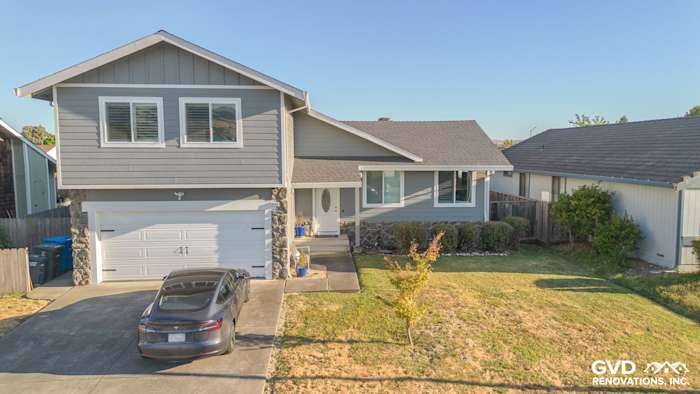 Home exterior featuring James Hardie Lap Plank Siding in Gray Slate with Arctic White Trim in Petaluma, CA