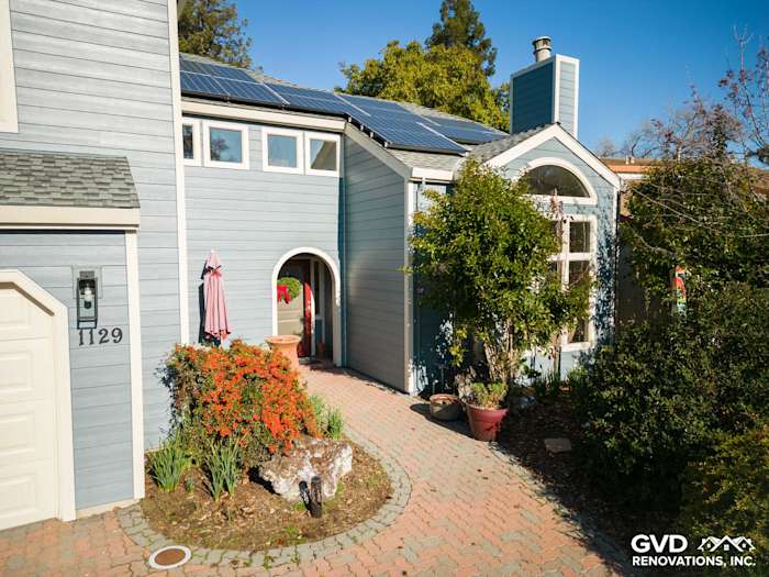 Boothbay Blue James Hardie siding exterior with landscaped path and solar panels in Davis, CA