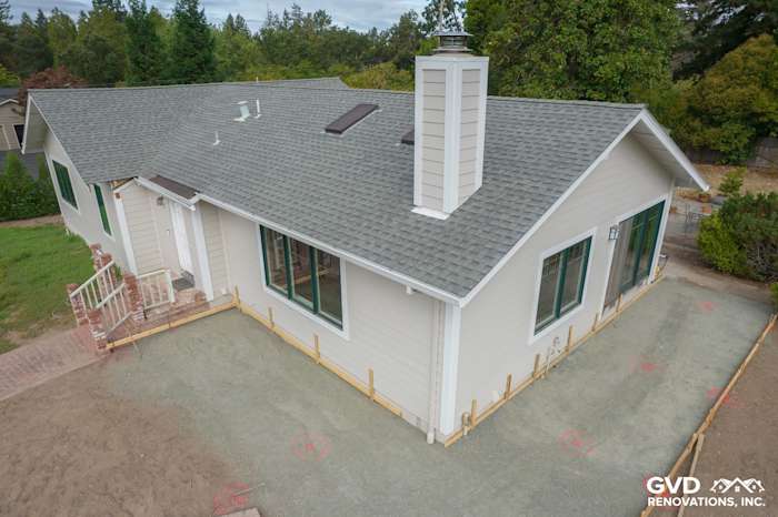 Home exterior featuring newly installed James Hardie siding in light color with Arctic white trim in Napa, CA