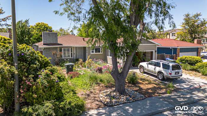 Home exterior in Mountain View, CA featuring James Hardie Lap and Board & Batten Siding in Monterey Taupe with Aged Pewter