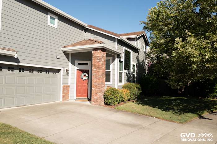 Gray Slate James Hardie siding and Milgard windows with brick accents at a Petaluma home entrance