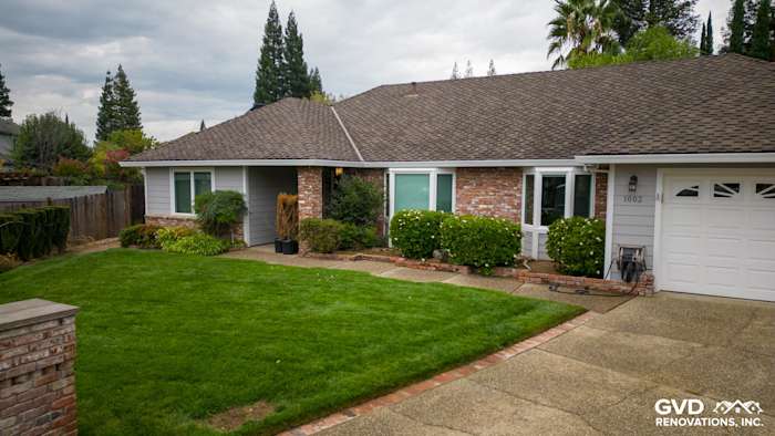 Roseville home exterior featuring James Hardie Cedarmill siding, Milgard windows, and well-maintained landscaping