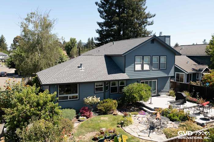 Home exterior featuring new Boothbay Blue James Hardie siding and Milgard windows in Rohnert Park, CA
